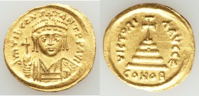 Tiberius II Constantine (AD 578-582). AV solidus (21mm, 4.40 gm, 6h). AU, scratches, edges filed. Constantinople, 5th officina, AD 579-582. d m TIb CO...