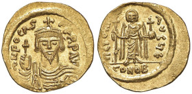 Focas (602-610) Solido - Busto coronato frontale tiene un globo crocigero nella mano d. - R/ VICTORIA AVGG, Angelo con lunga croce a d. con cristogram...