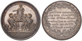 Medaglia 1804 Incoronazione di Napoleone. D/ “BONTE’ DE TITUS SAGESSE DE M. AURELE GENIE DE CHARLES M.” Nel campo 4 guerrieri sorreggono Napoleone in ...