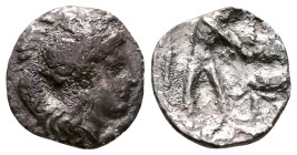 Southern Apulia, Tarentum, c. 380-325 BC. AR Diobol (10mm, 0.8 g). Head of Athena right, wearing crested helmet decorated with hippocamp. Rev. Herakle...