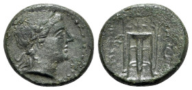 Bruttium, Petelia, late 3rd century BC. Æ (18mm, 4.55g, 12h). Laureate head of Apollo r. R/ Tripod. HNItaly 2455. Green patina, Good VF