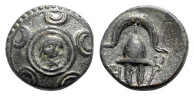 Kings of Macedon. Anonymous, after 311 BC. Æ (16mm, 3.82g, 2h). Macedonian shield, in centre head of Herakles in lionskin. R/ Macedonian helmet; monog...