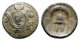 Kings of Macedon. Anonymous, after 311 BC. Æ (17mm, 4.17g, 10h). Macedonian shield, in centre head of Herakles in lionskin. R/ Macedonian helmet; mono...