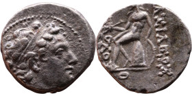 Demetrius II Nikator (Seleukid King: 144 – 138 BC and 129-126 BC ) Drachm Obv: Diademed head of King Rev: Apollo seated left on omphalos, testing arro...