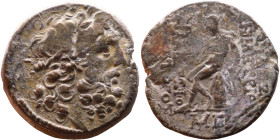 Demetrius II Nikator (Seleukid King: 144 – 138 BC and 129-126 BC ) Bronze coin. Obv: Head of Zeus Rev: Apollo seated left on omphalos, testing arrow a...