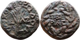 Claudius (41-54) Tiberias in Palestine Bronze. Obv: Palm branch; date across field Rev: TIBE-ΡIAC in two lines within wreath.

23mm 9,95g