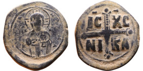Michael IV (1034-1041) Anonymous Follis Obverse: +ЄMMA-NOVH Nimbate Christ Antiphonetes standing facing Reverse: Large cross IC-XC / NI-KA

28mm 9,9...