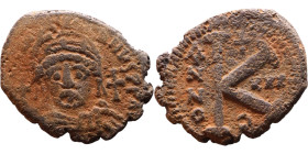 Justinian I (527-565) Half Follis. Obverse: DN IVSTINIANVS PP AVG, Armoured facing bust holding globus Reverse: Large M between ANNO and regnal year
...