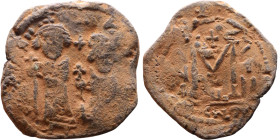 Heraclius and Hercalius Constantine (610-641) Follis. Obverse: Heraclius on left, Heraclius Constaninte on right, . Reverse: ANNO, Large M, cross abov...