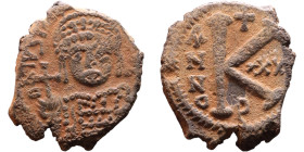 Justinian I (527-565) Half Follis. Obverse: DN IVSTINIANVS PP AVG, Armoured facing bust holding globus Reverse: Large M between ANNO and regnal year
...