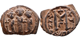 Heraclius, Martina and Heraclius Constantine (610-641) Follis Obverse: From left, Martina, Heraclius, heraclius Constantine Reverse: Large M, ANNO,
...