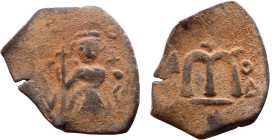 Constans II (641-668) Follis. Obverse: Imperial figure holding cross and globus Reverse: m and inscription

24mm 3,31g

Artificial sand patina
