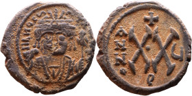 Maurice Tiberius (582-602) Half Follis Obverse: Crowned bust facing, wearing consular robes, holding mappa and eagle-tipped scepter , Reverse: Large X...