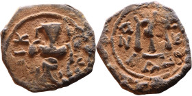 Constans II (641-668) Follis. Obverse: Imperial figure holding cross and globus Reverse: m and inscription

21mm 3,27g

Artificial sand patina