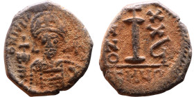 Justinian I (527-565) Decanummium. Obverse: DN IVSTINIANVS PP AVG, Armoured facing bust holding globus Reverse: Large I between ANNO and regnal year
...