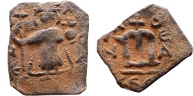 Constans II (641-668) Follis. Obverse: Imperial figure holding cross and globus Reverse: m and inscription

17mm 1,64g

Artificial sand patina