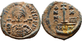 Justinian I (527-565) Decanummium. Obverse: DN IVSTINIANVS PP AVG, Armoured facing bust holding globus Reverse: Large I between ANNO and regnal year
...