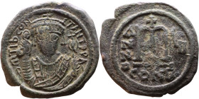 Tiberius II Constantine (578-582). Follis. Obverse: mperor, crowned and mantled bust facing, holding mappa and eagle-tipped sceptre, cross above eagle...