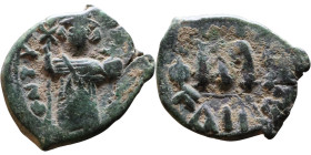 Constans II (641-668) Follis. Obverse: Imperial figure holding cross and globus Reverse: m and inscription

24mm 4,70g