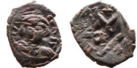 Constans II (641-668) Follis. Obverse: Imperial figure holding cross and globus Reverse: m and inscription

25mm 4,53g