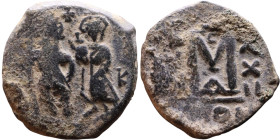Heraclius and Hercalius Constantine (610-641) Follis. Obverse: Heraclius on left, Heraclius Constaninte on right, . Reverse: ANNO, Large M, cross abov...