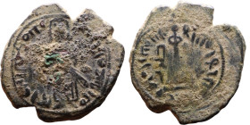 al-Malik ibn Marwan (687-705) Follis. Obverse: Standing caliph Reverse: Modified cross potent set on steps

20mm 3,88g