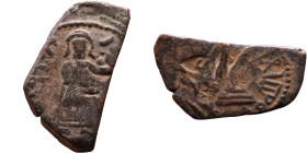 al-Malik ibn Marwan (687-705) Follis. Obverse: Standing caliph Reverse: Modified cross potent set on steps

25mm 2,67g