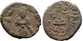 al-Malik ibn Marwan (687-705) Follis. Obverse: Standing caliph Reverse: Modified cross potent set on steps

18mm 3,19g