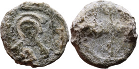 Late Roman / Byzantine period - Lead seal

24mm 8,00g