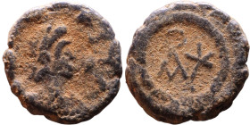 Anastasius (491-518) Nummus. Obverse: DN ANASTASIVS PP AVG. Diademed bust. Reverse: Monogram

11mm 1.05g

Artificial sand patina