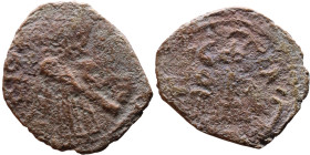 al-Malik ibn Marwan (687-705) Follis. Obverse: Standing caliph Reverse: Modified cross potent set on steps

19mm 2.50g