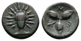 Lucania. Metapontum. Circa 300-250 BC. Bronze (13.53 mm, 2.25 g.). Facing bust of Helios. Rev. M – E. Three barley grains in the shape of a star; belo...