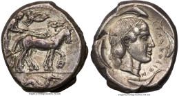 SICILY. Syracuse. Ca. 450-440 BC. AR tetradrachm (25mm, 17.00 gm, 12h). Choice VF, tooled. Charioteer driving quadriga walking right, kentron in right...