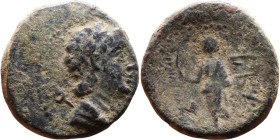 Marathos, Phoenicia. (2 century BC) Bronze coin. Obv: Laureate head of Hermes rightt Rev: Marathos, standing left, leaning on column, holding aphlasto...
