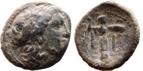 Seleukos I Nikator (Seleukid King: 312-260 BC). AE bronze. Obv.: Laureate head of Apollo right, with wavy locks Rev: Athena Promachos standing right, ...