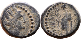 Marathos, Phoenicia. (2 century BC) Bronze coin. Obv: Turreted and draped bust of Tyche right Rev: Marathos, standing left, leaning on column, holding...