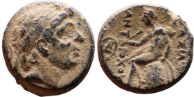 Antiochus I Soter (Seleukid King: 281-261 BC). AE bronze. Obv.: Diademed head of King Rev: Apollo seated left on omphalos, testing arrow and resting l...