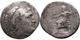 Alexander III (336-323 BC) Tetradrachm Obverse: Head of Herakles to right, wearing lion skin headdress Rev: Zeus seated left on low throne, holding lo...