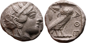 ATTICA, Athens. Circa 454-404 BC. AR Tetradrachm Obverse: Head of Athena right, with frontal eye, wearing earring, necklace, and crested Attic helmet ...
