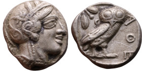 ATTICA, Athens. Circa 454-404 BC. AR Tetradrachm Obverse: Head of Athena right, with frontal eye, wearing earring, necklace, and crested Attic helmet ...
