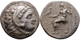 Alexander III (336-323 BC) Drachm Obverse: Head of Herakles to right, wearing lion skin headdress Rev: Zeus seated left on low throne, holding long sc...