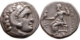 Alexander III (336-323 BC) Drachm Obverse: Head of Herakles to right, wearing lion skin headdress Rev: Zeus seated left on low throne, holding long sc...