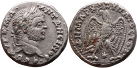 Caracalla (211-217) Tetradrachm. Obverse: Bust of emperor. Reverse: Eagle standing left, head right, wreath in beak, tail right, wings spread

25mm ...