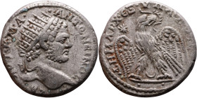 Caracalla (211-217) Tetradrachm. Obverse: Bust of emperor. Reverse: Eagle standing left, head right, wreath in beak, tail right, wings spread

24mm ...