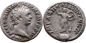 Domitian (81-96) Denarius Obv: Laureate, draped bust of emperor. Rev: Minerva standing right on capital of rostral column, holding spear and shield, o...