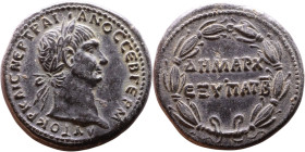 Trajan (98-117) Antioch Bronze coin. Obv: Laureate, draped bust of emperor. Rev:Inscription in two lines within laurel-wreath

26mm 13.85g
