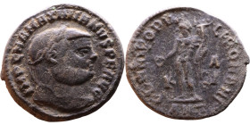 Maximianus. (286-305 ) Follis Obv: Laureate head right. Rev.: Genius standing left holds cornucopia

27mm 9.39g