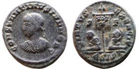 Constantine II (Caesar: 317–337 AD). Follis. Obv: Bust of Caesar Rev: Standard inscribed between two captives, both looking left.

18mm 3.21g