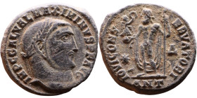 Maximinus II Daza (305-313) Follis Obv: Cuirassed bust of emperor Rev: Jupiter standing left, chlamys across left shoulder, leaning on scepter with ea...