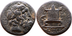 Syria: Antioch. (1th century BC) Bronze obv: Bust of Zeus. Rev: Altar

18mm 5.11g